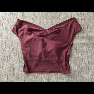 Kortni Jeane med maroon off the shoulder top